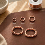 Small copper earrings by Livia